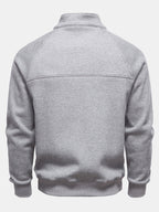 Pullover mit gerippten Raglanärmeln und Viertelreißverschluss