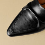 Marloe Spitz zulaufende Leder-Mules" could be rewritten as "Marloe Leder-Mules mit spitz zulaufendem Design.