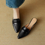 Marloe Spitz zulaufende Leder-Mules" could be rewritten as "Marloe Leder-Mules mit spitz zulaufendem Design.