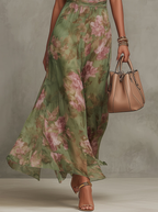 Livia | Elegantes Maxikleid mit floralem Design und Halterträgern