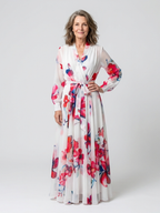 "Lillian | Florales Maxikleid mit langen Ärmeln" can be rewritten as "Lillian | Langärmliges Maxikleid mit floralem Design".