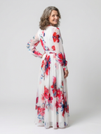 "Lillian | Florales Maxikleid mit langen Ärmeln" can be rewritten as "Lillian | Langärmliges Maxikleid mit floralem Design".